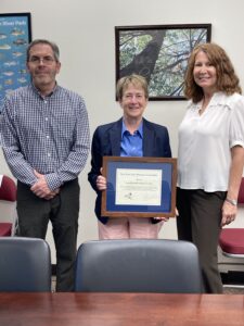 NYSHA's Diane Fingar and John Scheib presented award to Assembly Member Glick.