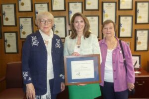 NYSHA's Pat Valusek and Sondra Woodvine presented award to Senator Hinchey.