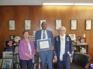 NYSHA's Pat Valusek and Sondra Woodvine presented award to Assembly Member Pretlow.